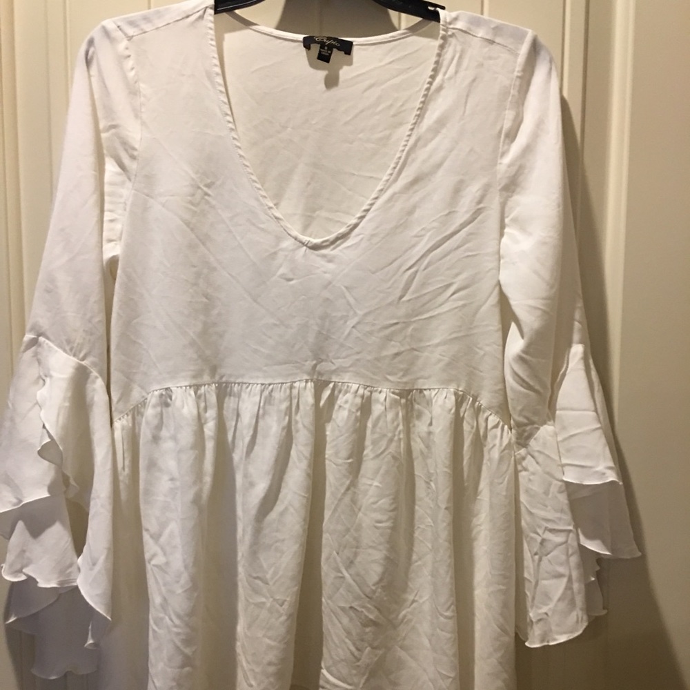 Versona White high low ruffle sleeve blouse.